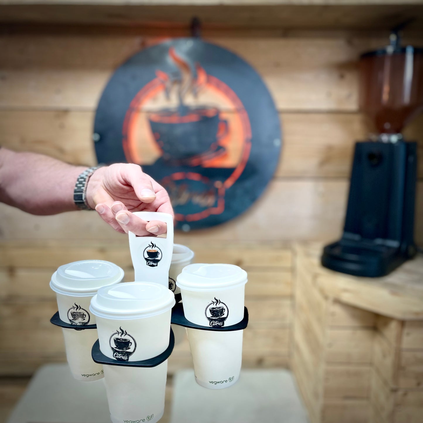 Re-usable, folding cup carry tray